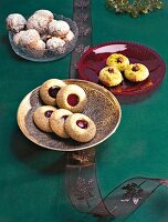 Spice balls, nougat balls and poppy eyes Christmas cookies on plate