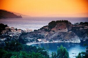 View of Taormina town at sunset, Sicily, Italy