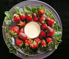Chocolate strawberries with wine foam sauce, overhead view