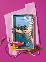 Photo collage made with red car with Hotel Cap Estel in background