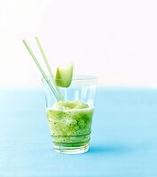 Close-up of melon smoothie in glass