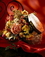 Close-up of dried bouquet in silver box