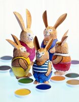 Colourful Easter bunny made of egg on white background