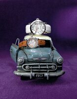 Toy car with two diamond watches on purple background
