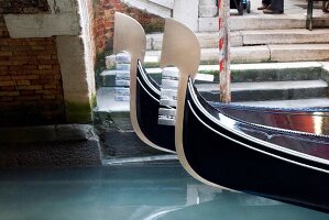 Close-up of tip of Gondola with ornate decoration at Venice, Italy