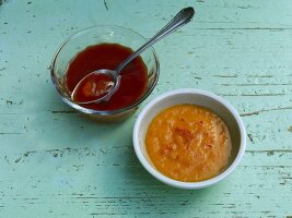 Two bowls of mango and beer marinades