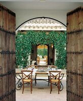 Patio of a house with opened door in Andalusia, Spain