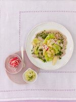 Asparagus salad on slices of veal on plate