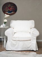 White armchair and retro bistro table