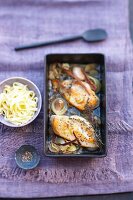Baked chicken breast with thyme and a bowl of tagliatelle
