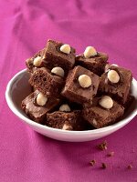 Brownies with macadamia nuts in bowl