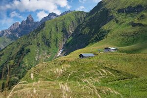 View of wellness Hotel Enzian hut in mountains, Immenstadt, Allgau, Germany