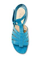 Close-up of turquoise ankle strap sandal on white background