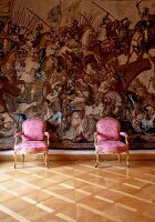 Two purple chairs in front of Tapestry wall in St. Emmeram's Abbey, Regensburg, Germany