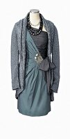 gray coat over festive dress with side knot on mannequin