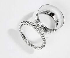 Round bangles with silver optics on white background