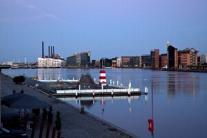 View of jetties with cityscape at Islands Brygge, Copenhagen, Denmark