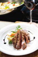 Fried kobe beef with vegetables on plate