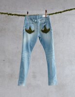 Jeans with moss on rope
