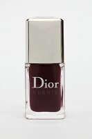 Close-up of nail polish in black plum colour