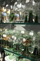 Close-up of various type of wine glasses with price tags