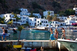 Tourists in Loutro bay in Crete, Greek