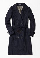 Black double-breasted trench coat with tie belt on white background