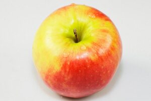 Close-up of apple on white background