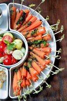 Carrots skewer with mint pesto in serving bowl