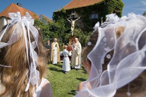 Procession on road in Franconian Switzerland, Bavaria, Germany