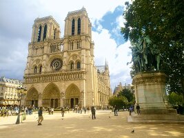 View of tourists outside Notre-Dame Cathedral in Paris, France