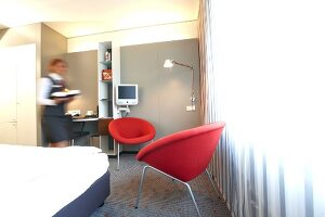 Housekeeper at room in hotel at Vaihingen, Stuttgart, Baden-Wurttemberg, Germany