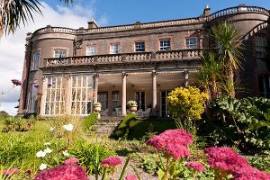 Facade of Bantry House and terrace garden, Ireland, UK