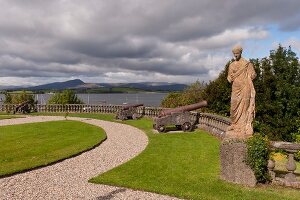 View of front garden in Bantry House with sea in background, Ireland, UK