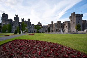 View of Ashford Castle with pavement and garden, Ireland, UK