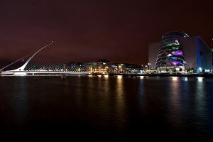 View of illuminated Samuel Becket Bridge at night, Dublin, Ireland, UK