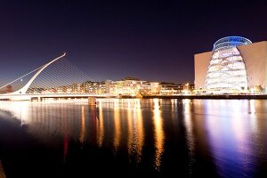 View of illuminated Samuel Becket Bridge at night, Dublin, Ireland, UK