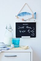 A maritime memo board on a kitchen wall