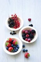 Bowls of various fresh berries