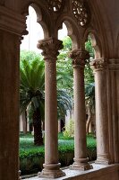 Arcades and columns of old Dominican monastery in Dubrovnik, Croatia