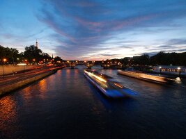 Pont Alexandre III over Seine river in night lights in Paris, France