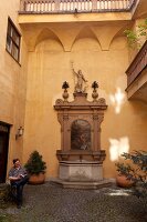 Wall fountain in Eserhauses in Maximilian Street, Augsburg, Bavaria, Germany