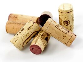 Close-up of corks on white background