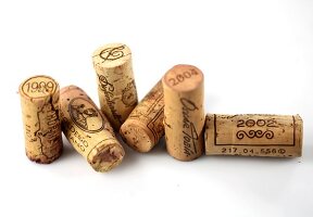 Various corks with year printed on white background