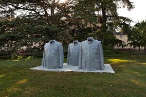 Mao jacket sculptures in Castle Park, Bad Homburg, Hesse, Germany
