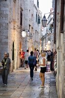 People walking on old town streets of Dubrovnik, Croatia