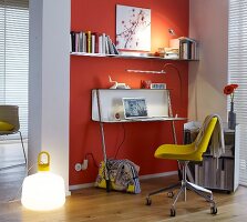 Desk with laptop, chair, lamp and shelf