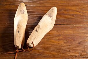 Wooden clogs as tools of shoemaker