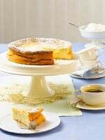 Sliced Baden cheesecake on a cake stand