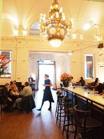 Guests at table in Stanislavski restaurant, Stadsschouwburg, Amsterdam, Netherlands